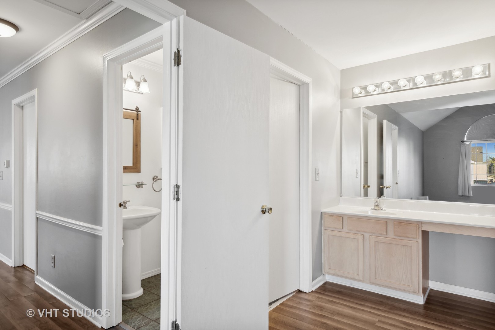 618 Silver Creek Road, Unit 618 Woodstock, IL 60098 - Photo 14 of 21 a bathroom with a sink and a mirror