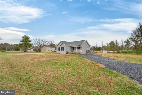$335,000 | 32998 Forest Knoll Drive, Laurel, DE 19956