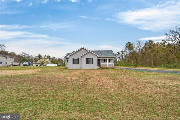 $335,000 | 32998 Forest Knoll Drive, Laurel, DE 19956