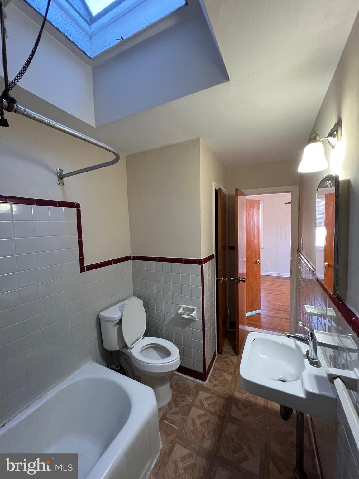 7238 Dungan Road Philadelphia, PA 19111 - Photo 8 of 15 a bathroom with a sink and a mirror