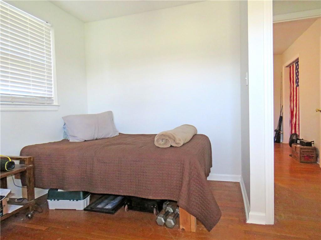 4672 Vernon Drive Southwest Mableton, GA 30126 - Photo 15 of 42 a bedroom with a bed and a table in it