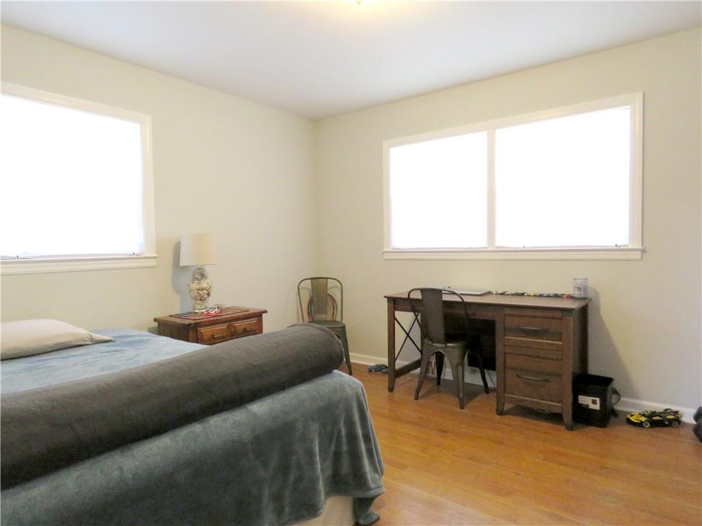 4672 Vernon Drive Southwest Mableton, GA 30126 - Photo 16 of 42 a bedroom with a bed and a desk