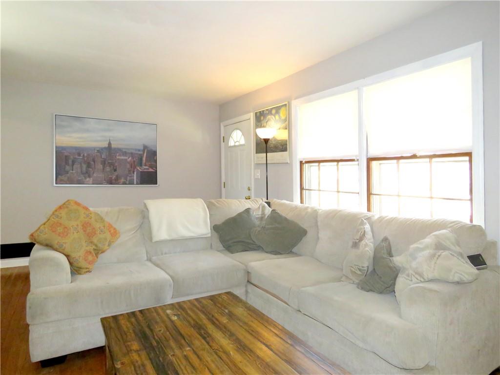 4672 Vernon Drive Southwest Mableton, GA 30126 - Photo 29 of 42 a living room with a couch and a large window