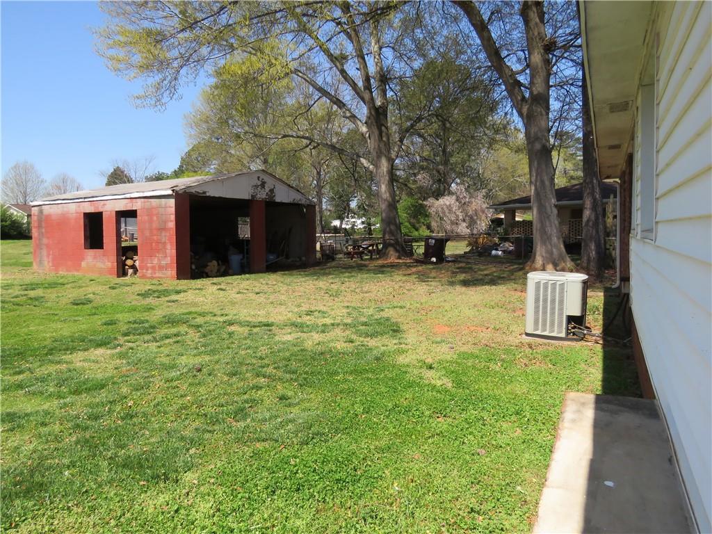 4672 Vernon Drive Southwest Mableton, GA 30126 - Photo 34 of 42 a view of a house with a yard