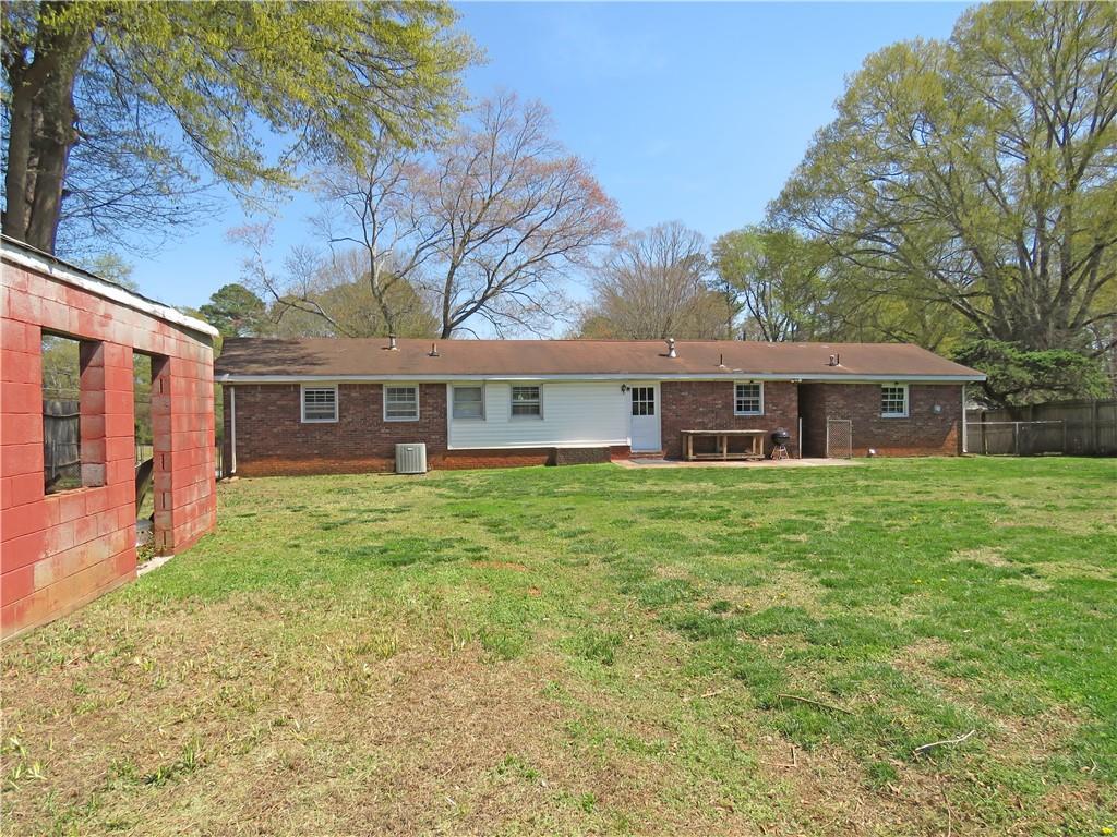 4672 Vernon Drive Southwest Mableton, GA 30126 - Photo 36 of 42 a front view of a house with a garden