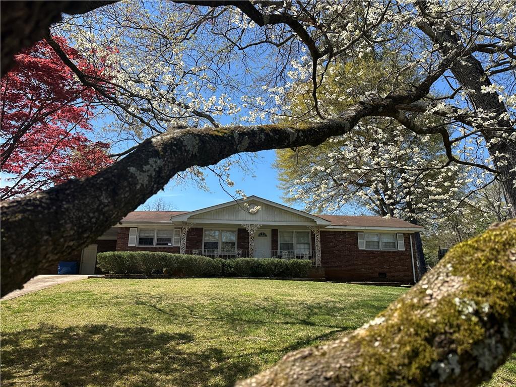 4672 Vernon Drive Southwest Mableton, GA 30126 - Photo 42 of 42 a front view of a house with a yard