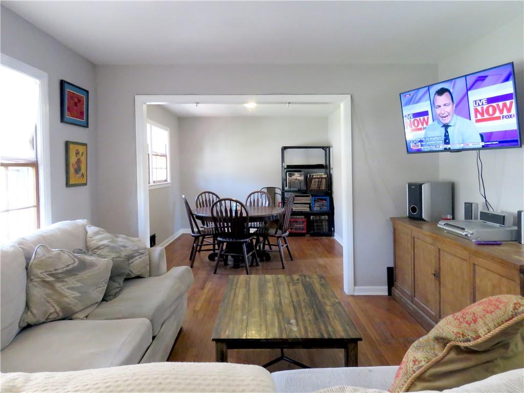 4672 Vernon Drive Southwest Mableton, GA 30126 - Photo 8 of 42 a living room with furniture and a flat screen tv
