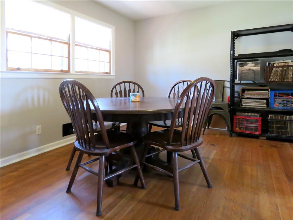 4672 Vernon Drive Southwest Mableton, GA 30126 - Photo 9 of 42 a view of a dining room with furniture window and wooden floor
