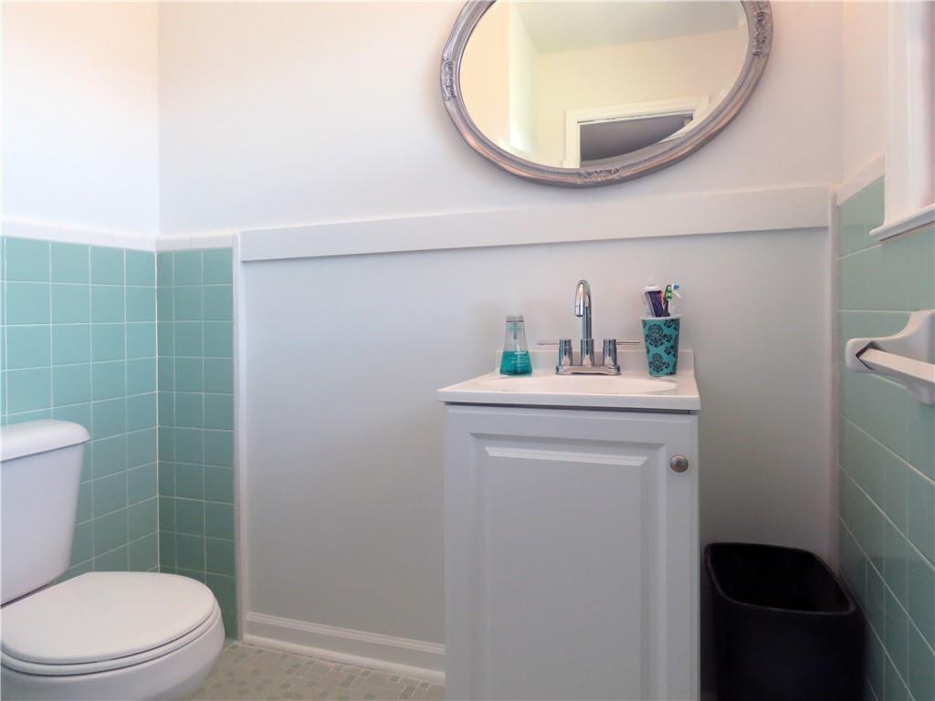 4672 Vernon Drive Southwest Mableton, GA 30126 - Photo 10 of 42 a bathroom with a sink a toilet and a mirror