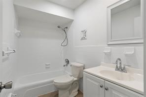 8291 Northwest 39th Street Coral Springs, FL 33065 - Photo 4 of 7 a bathroom with a sink toilet and shower