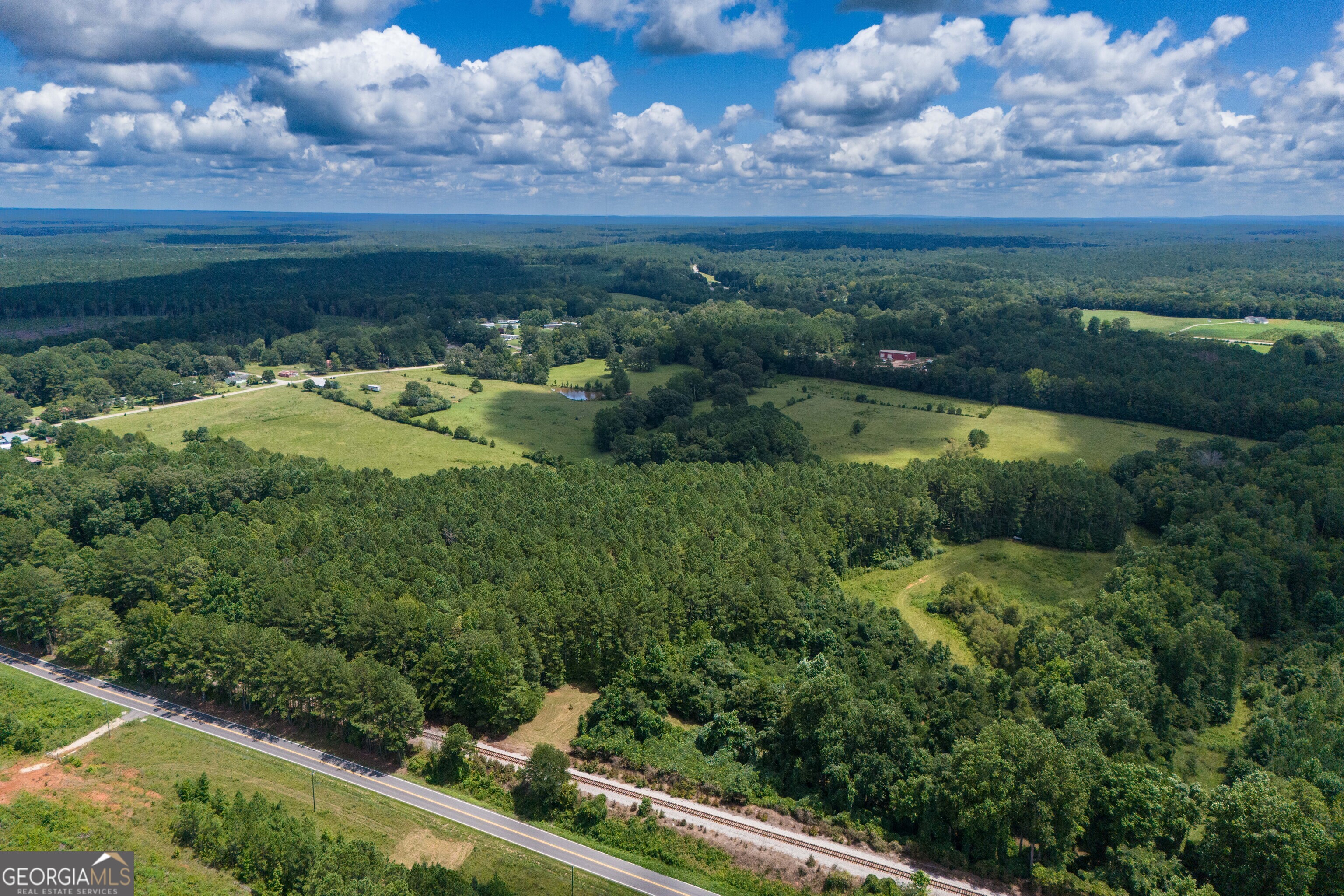 132 Hines Road Hogansville, GA 30230 - Photo 14 of 31 a view of a lake with a yard