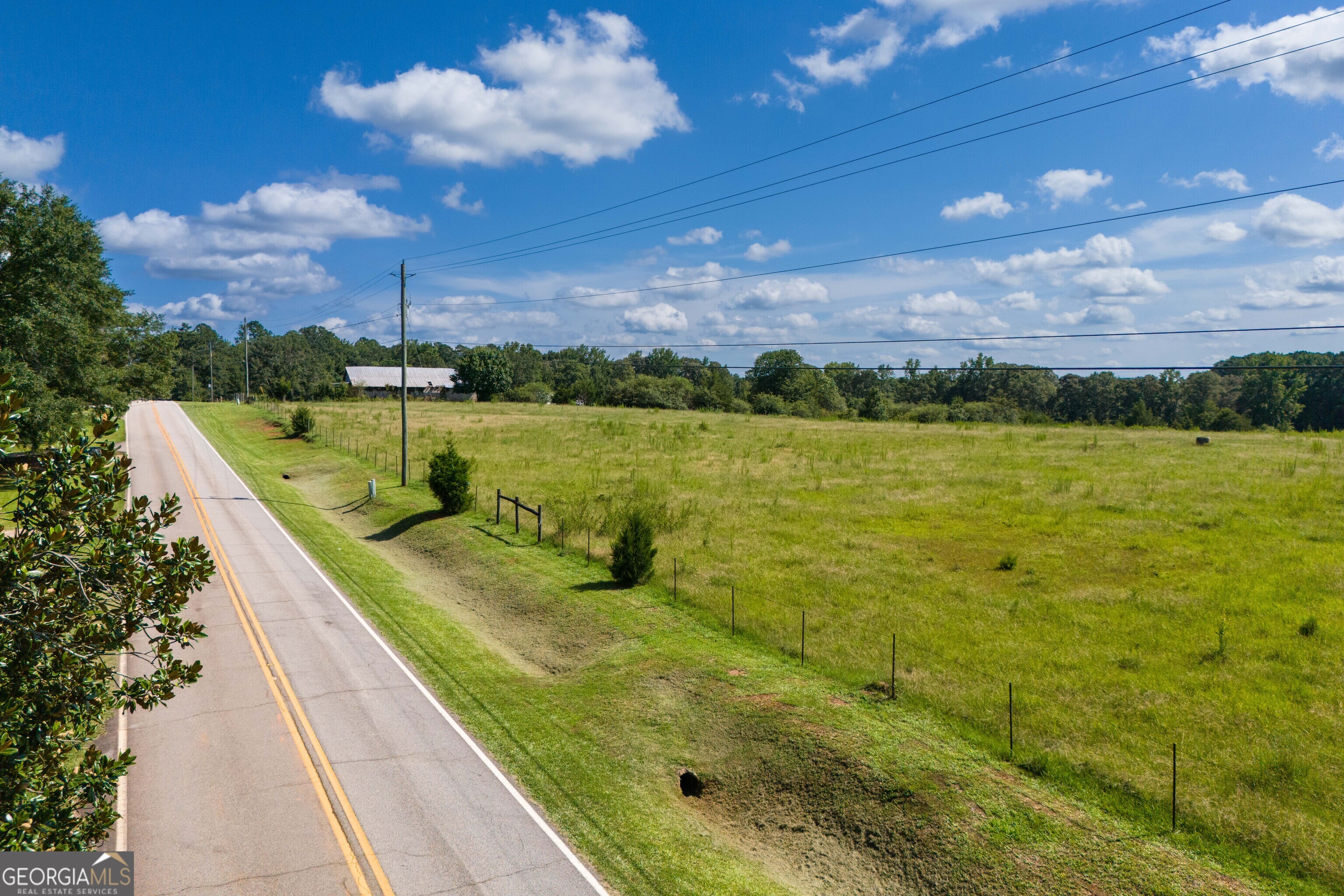 132 Hines Road Hogansville, GA 30230 - Photo 6 of 31 a view of a lake with a big yard