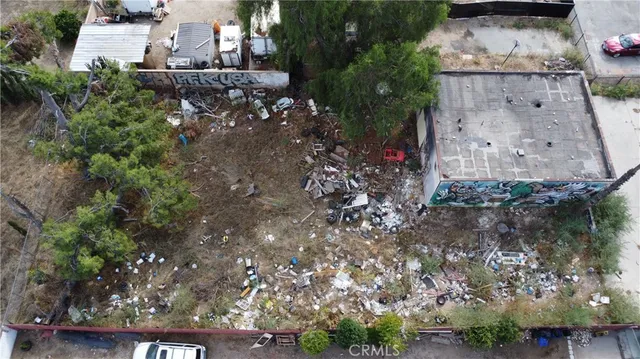 an aerial view of residential house with outdoor space
