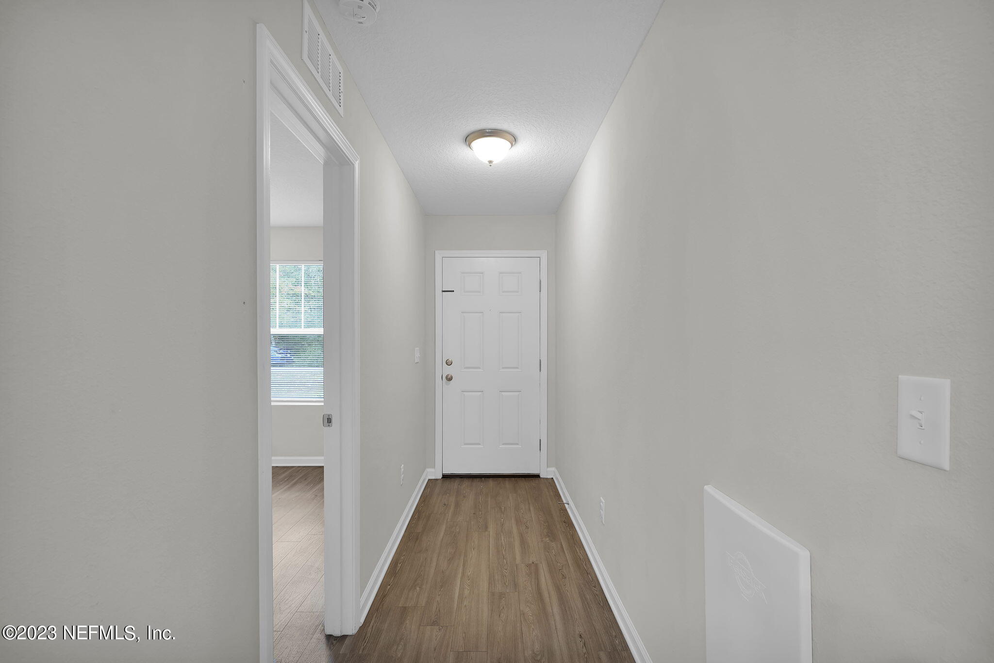3082 Jennings Road Jacksonville, FL 32218 - Photo 12 of 17 a view of a room with wooden floor