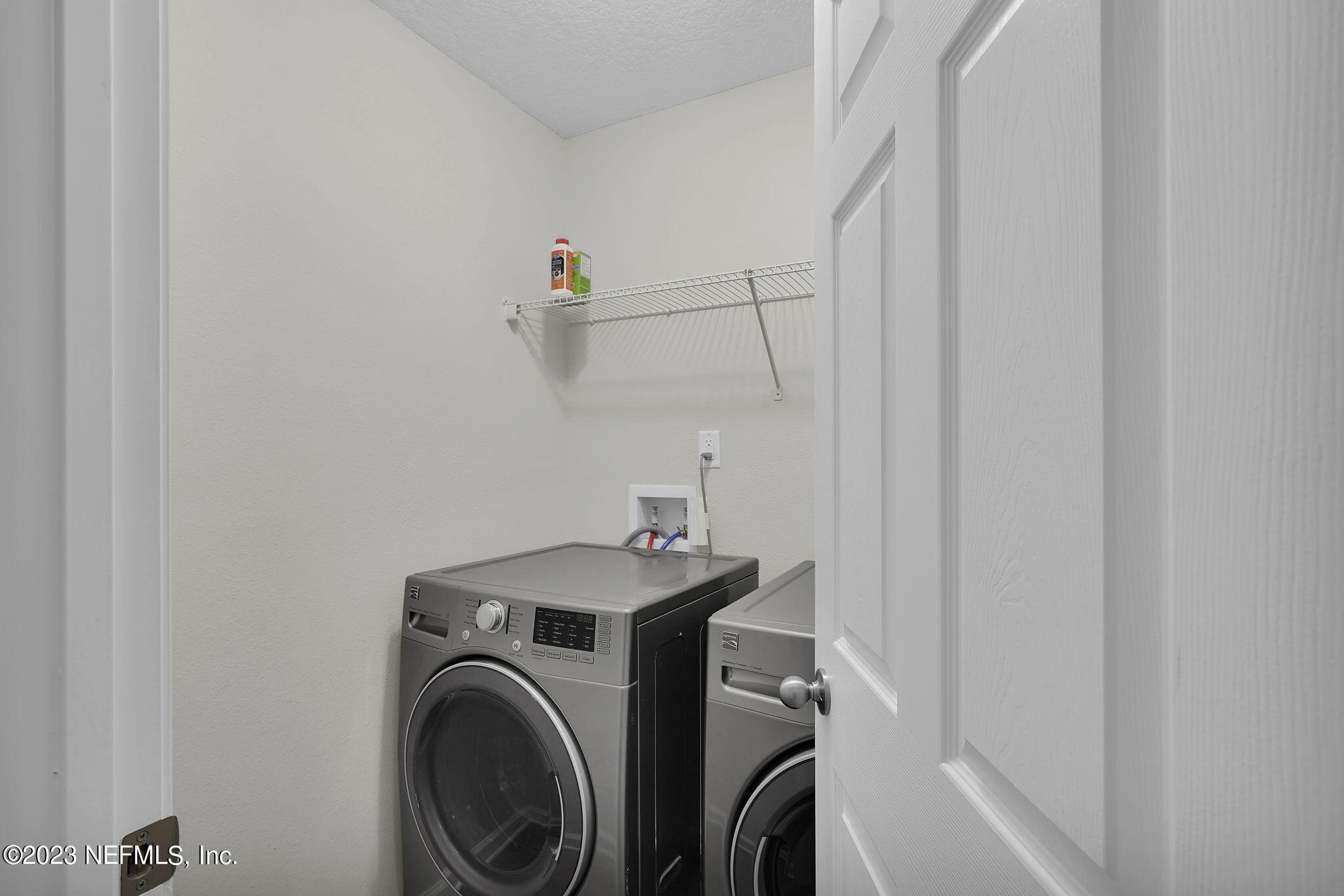3082 Jennings Road Jacksonville, FL 32218 - Photo 7 of 17 a utility room with dryer and washer