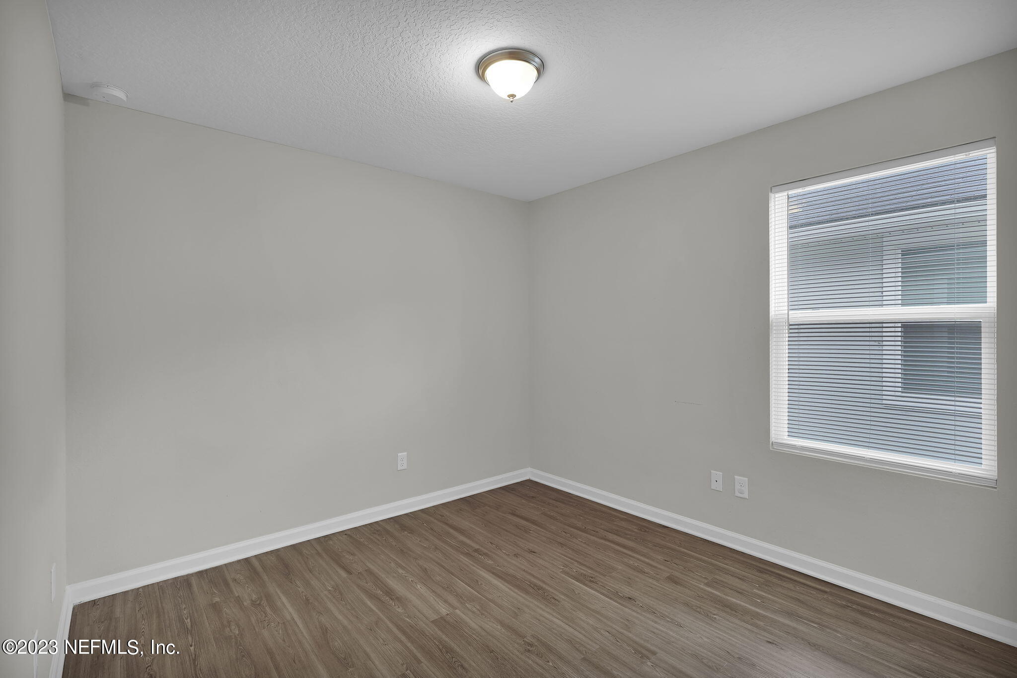 3082 Jennings Road Jacksonville, FL 32218 - Photo 10 of 17 an empty room with a window
