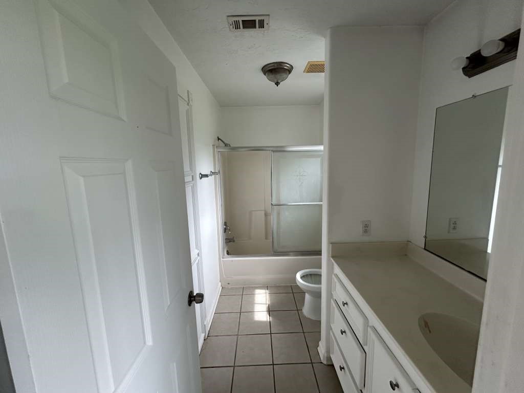 3 John Kay Road Huntsville, TX 77320 - Photo 16 of 23 a bathroom with a tub and a shower