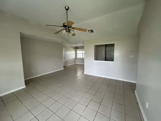 a view of an empty room and window