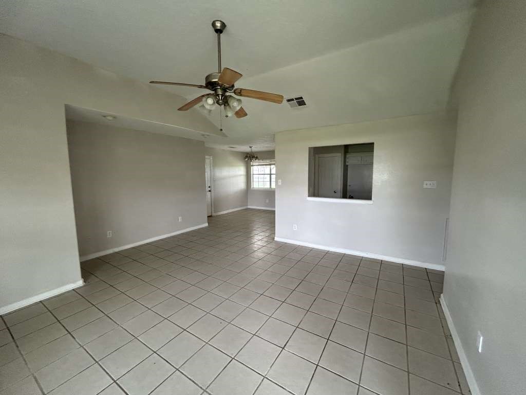 3 John Kay Road Huntsville, TX 77320 - Photo 5 of 23 a view of an empty room and window