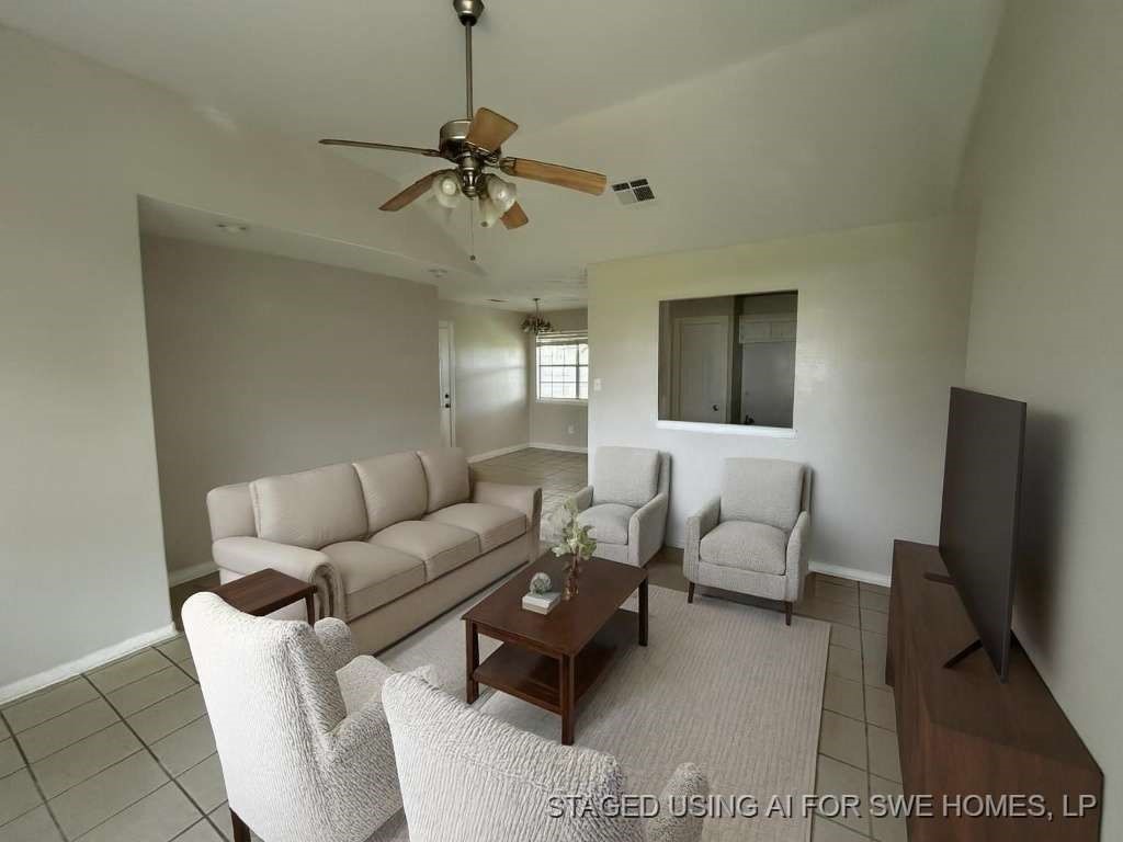 3 John Kay Road Huntsville, TX 77320 - Photo 6 of 23 a living room with furniture wooden floor and a flat screen tv