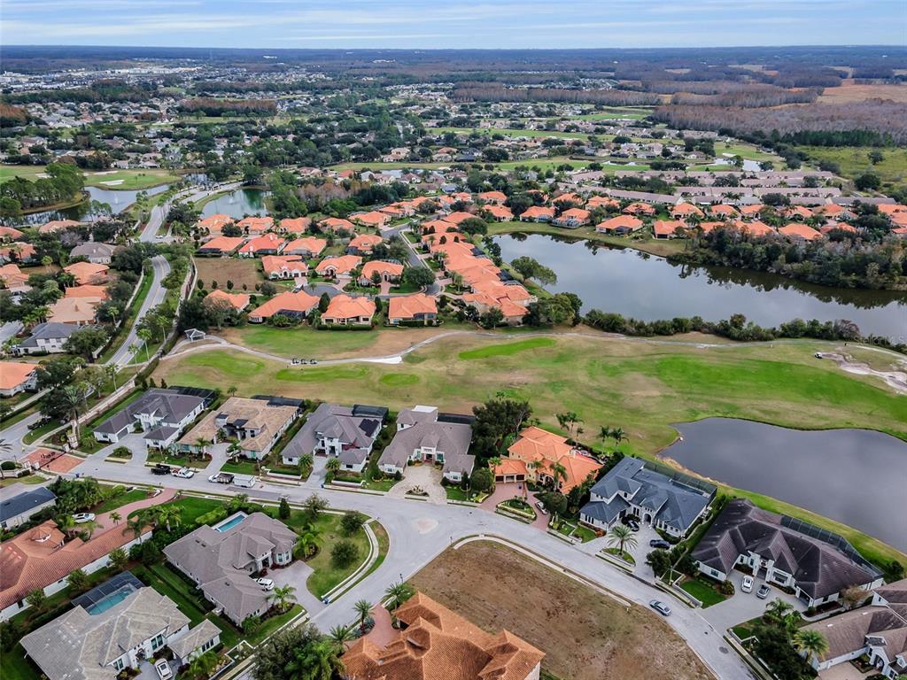 10610 Sabella Drive Trinity, FL 34655 - Photo 19 of 46 an aerial view of a residential houses and outdoor space