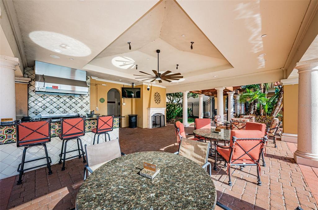 10610 Sabella Drive Trinity, FL 34655 - Photo 37 of 46 a outdoor space with lots of tables and chairs