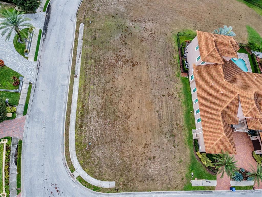 10610 Sabella Drive Trinity, FL 34655 - Photo 7 of 46 an aerial view of a house with garden space and trees