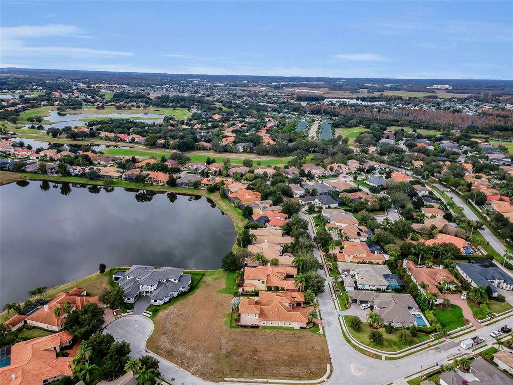10610 Sabella Drive Trinity, FL 34655 - Photo 10 of 46 an aerial view of a house with a lake view