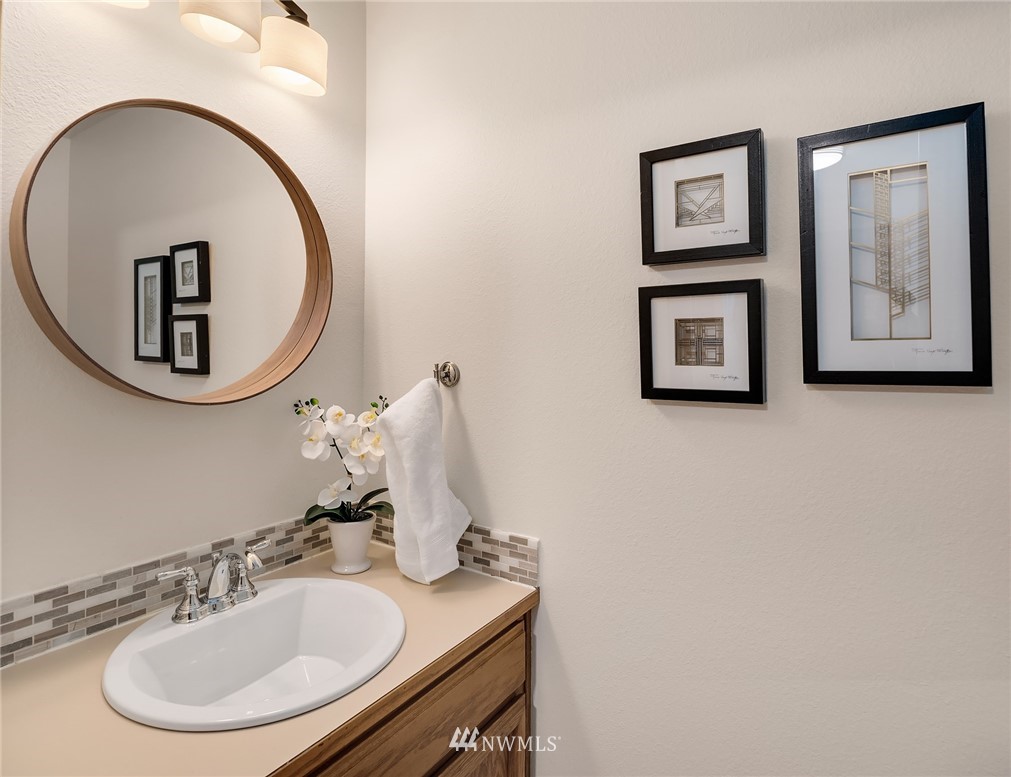 21031 Shell Valley Way Edmonds, WA 98026 - Photo 22 of 32 a bathroom with a toilet and a sink