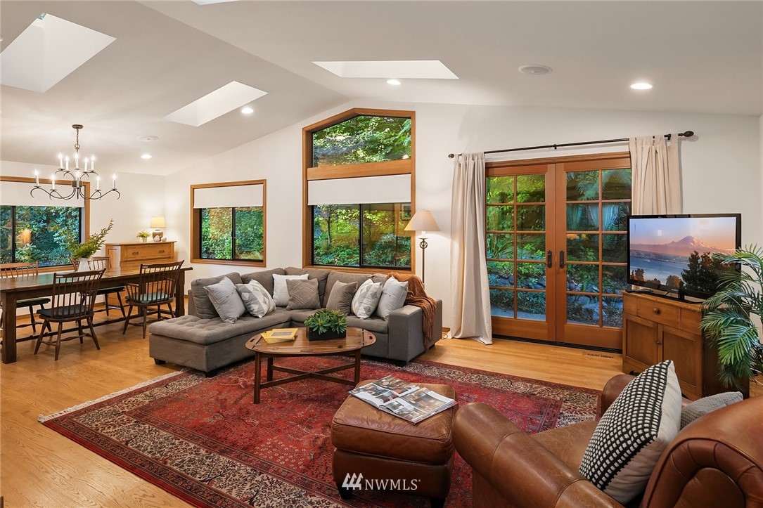 21031 Shell Valley Way Edmonds, WA 98026 - Photo 4 of 32 a living room with furniture and a floor to ceiling window