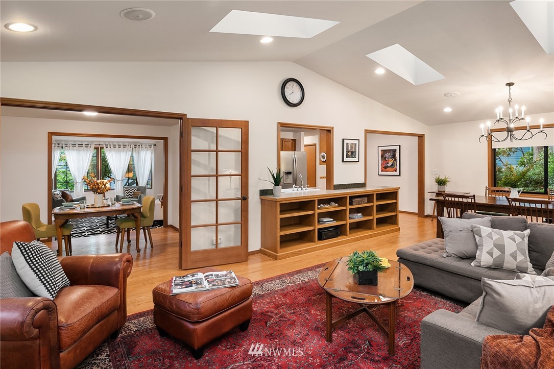 21031 Shell Valley Way Edmonds, WA 98026 - Photo 6 of 32 a living room with furniture a rug and a table
