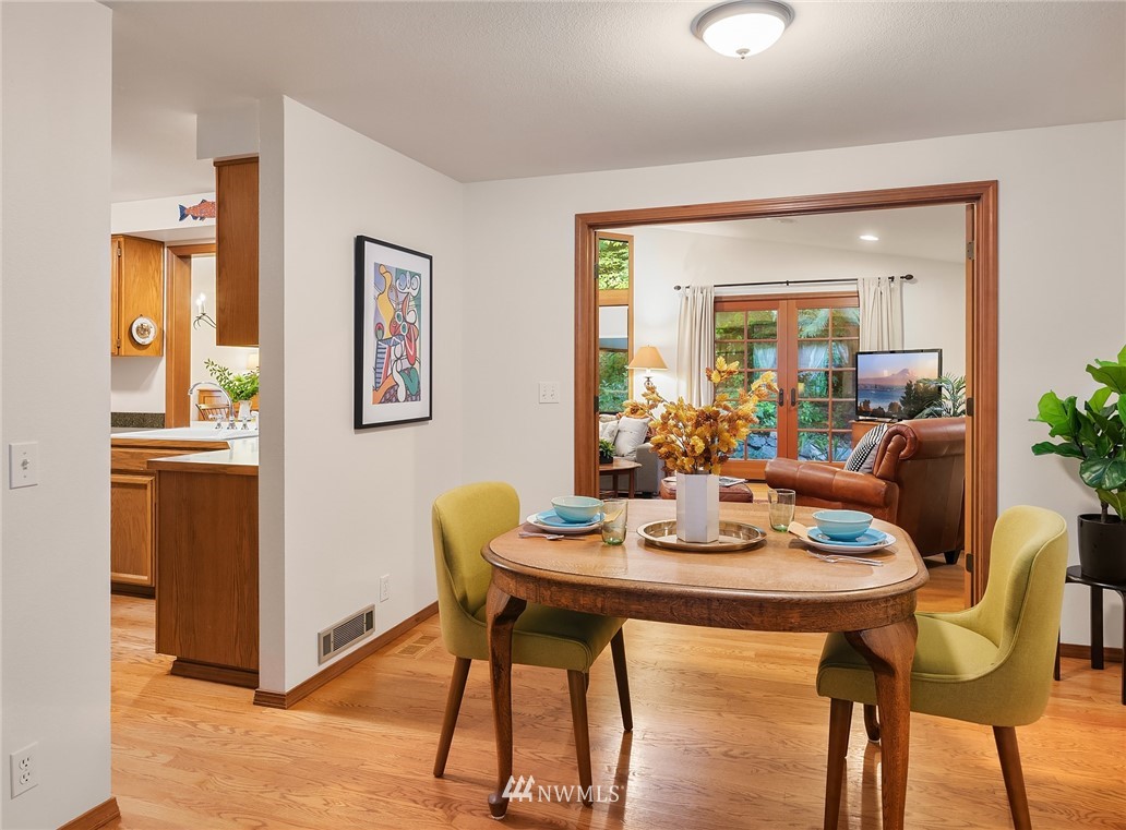 21031 Shell Valley Way Edmonds, WA 98026 - Photo 8 of 32 a view of a dining room with furniture and window