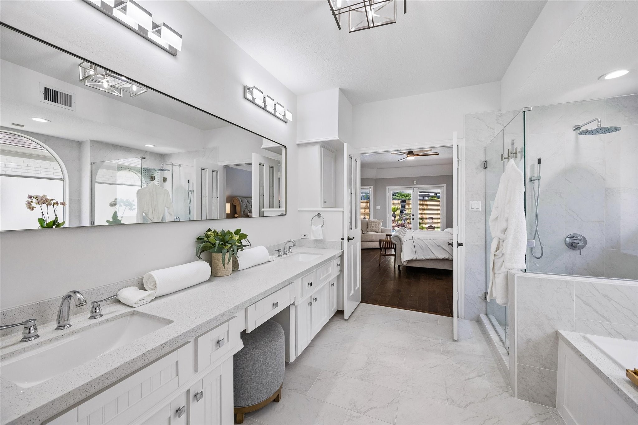 146 Golden Shadow Circle Spring, TX 77381 - Photo 22 of 41 The expansive primary bathroom provides generous countertop space with double sinks and an oversized layout designed for comfort and functionality.
