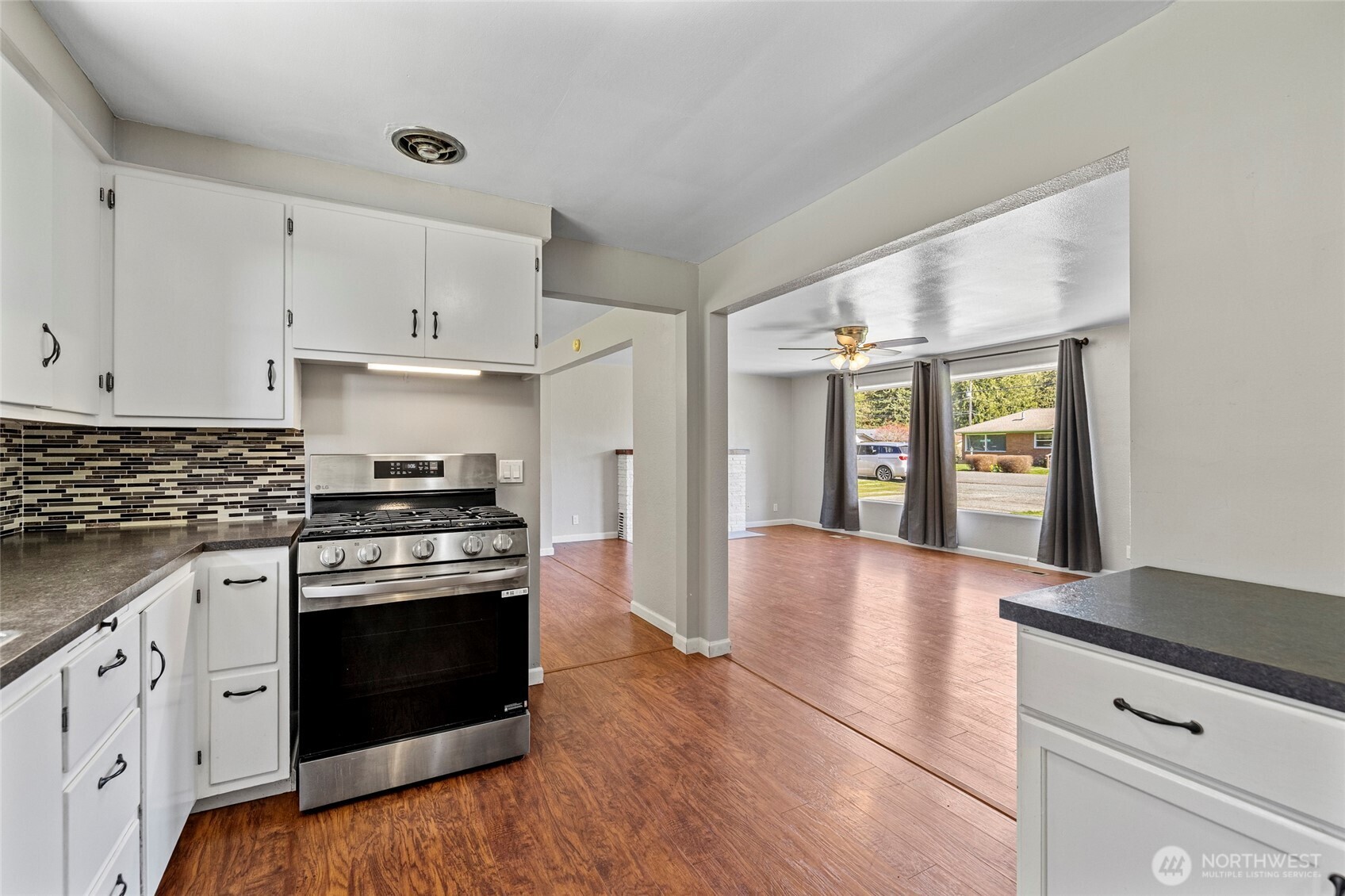 10450 Sterling Road Sedro-Woolley, WA 98284 - Photo 15 of 33 a kitchen with stainless steel appliances granite countertop a stove and cabinets