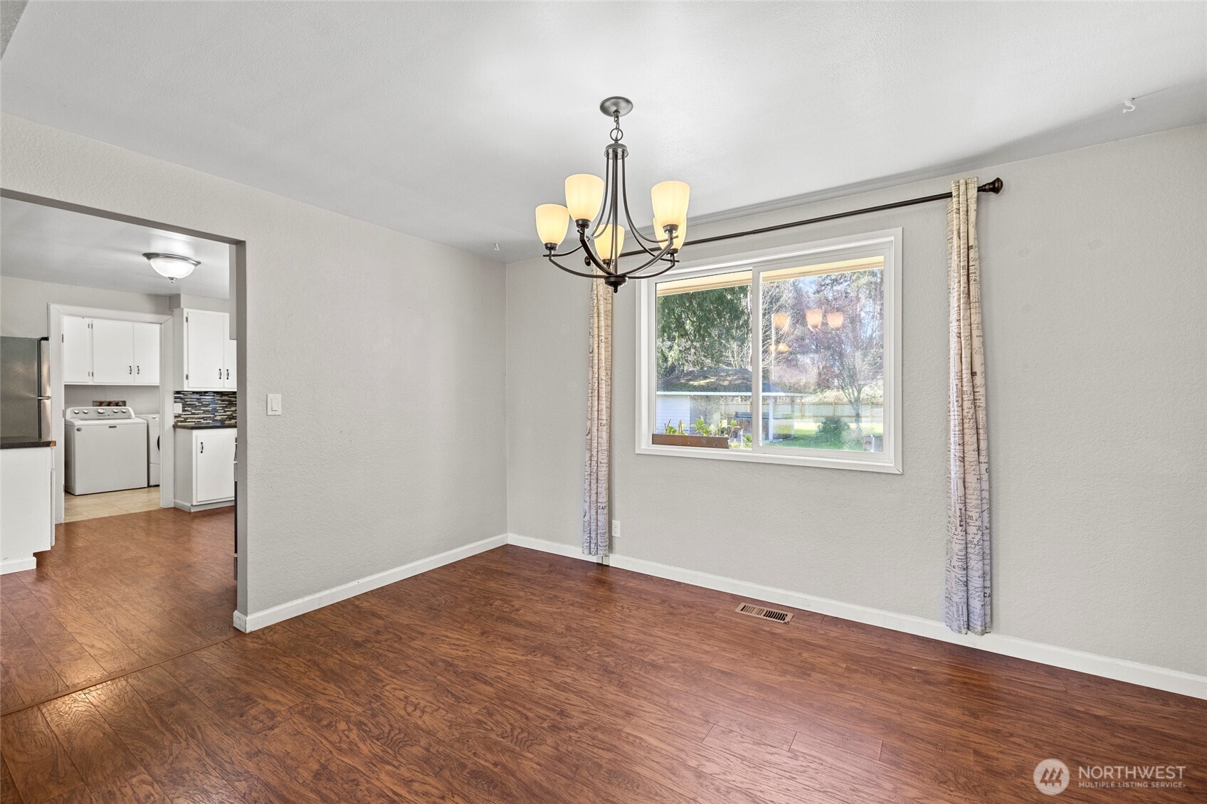 10450 Sterling Road Sedro-Woolley, WA 98284 - Photo 18 of 33 a view of empty room with wooden floor and windows