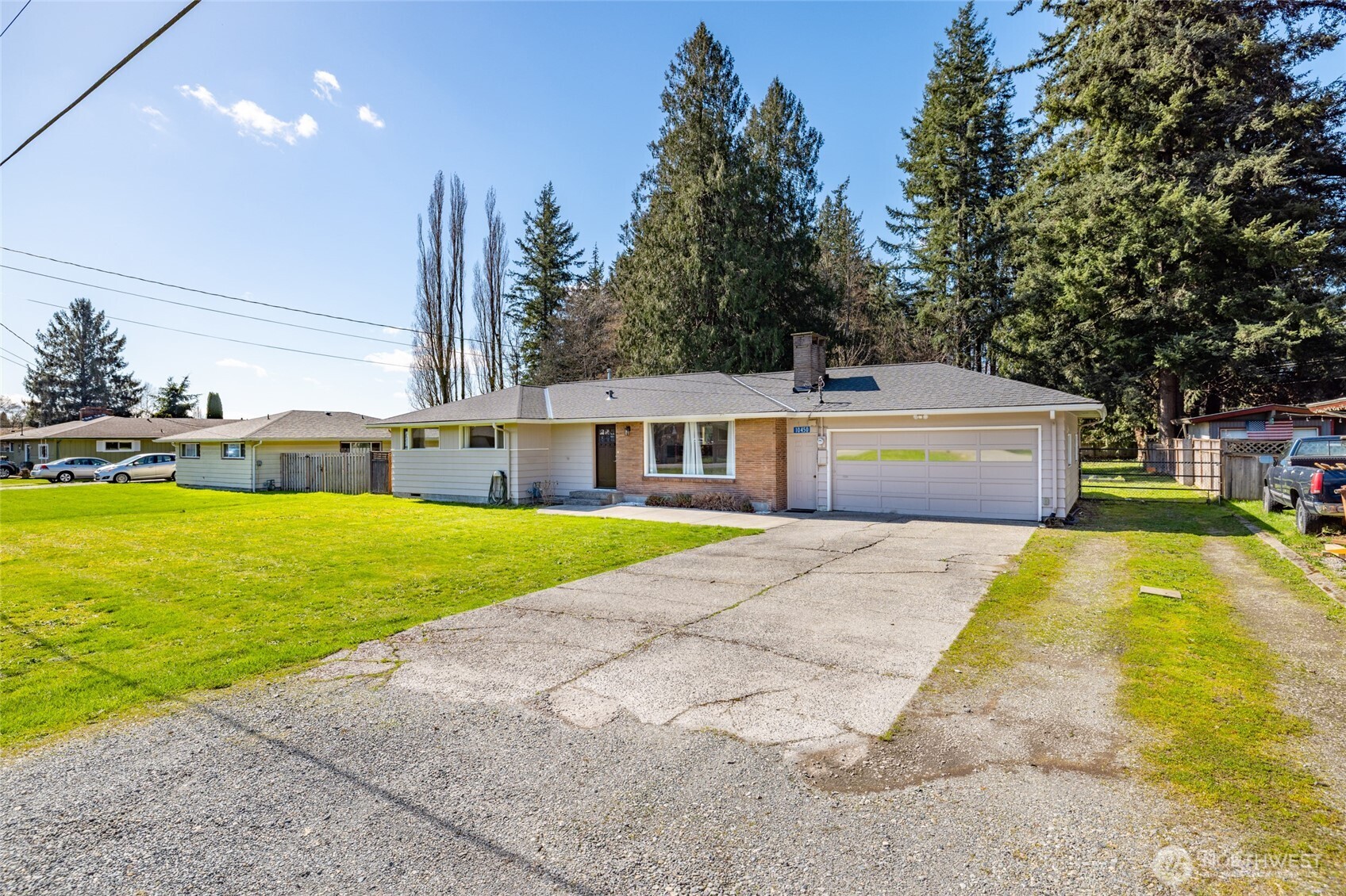 10450 Sterling Road Sedro-Woolley, WA 98284 - Photo 2 of 33 a front view of house with yard and swimming pool