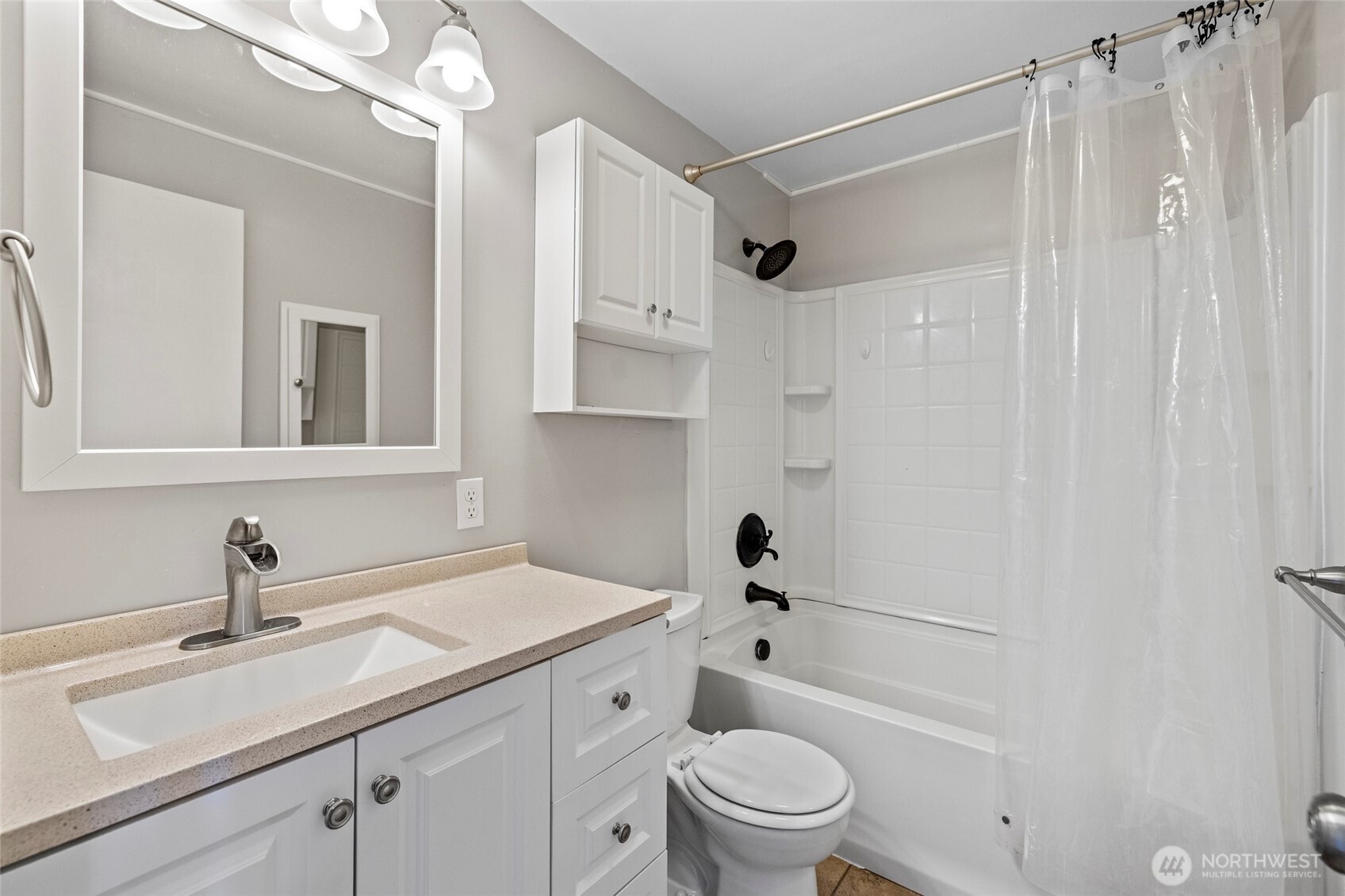10450 Sterling Road Sedro-Woolley, WA 98284 - Photo 23 of 33 a bathroom with a sink a toilet a mirror and shower