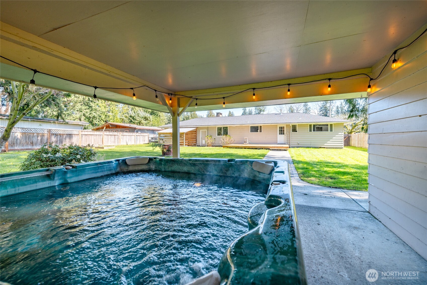 10450 Sterling Road Sedro-Woolley, WA 98284 - Photo 5 of 33 a view of a swimming pool with a patio