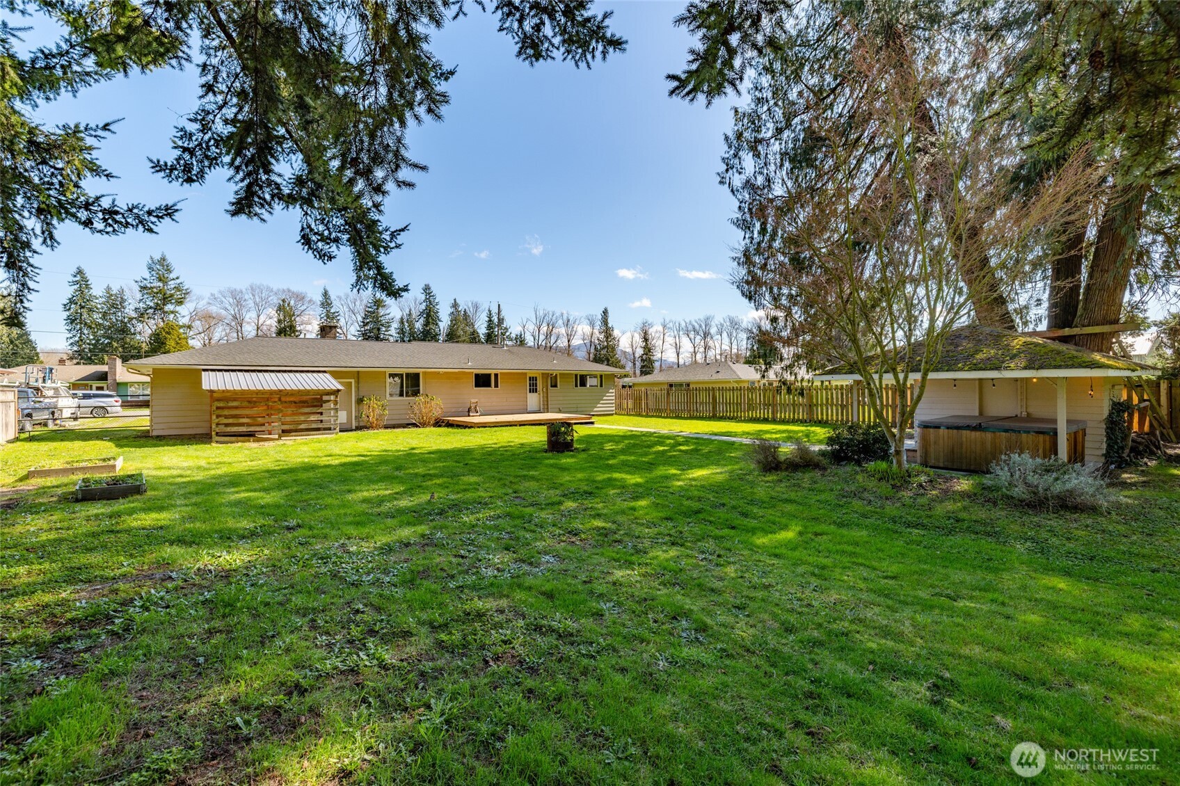 10450 Sterling Road Sedro-Woolley, WA 98284 - Photo 6 of 33 a view of a swimming pool with lawn chairs and a big yard