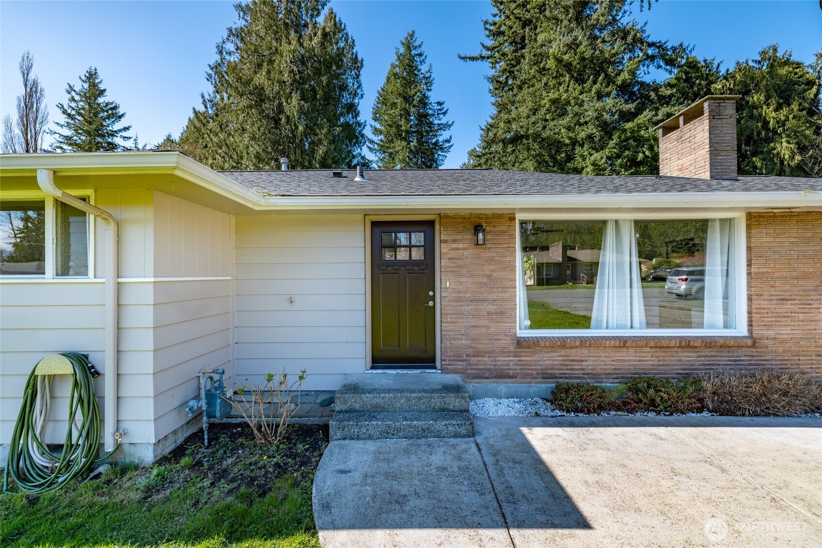 10450 Sterling Road Sedro-Woolley, WA 98284 - Photo 8 of 33 a view of a house with a backyard