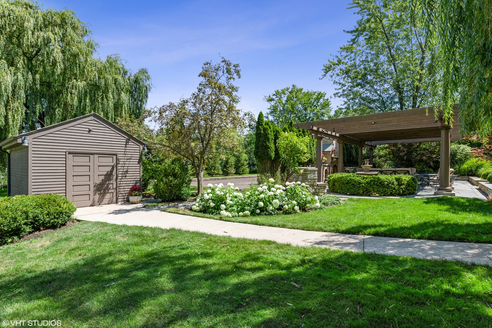 916 Shermer Road Northbrook, IL 60062 - Photo 42 of 54 a front view of a house with a yard