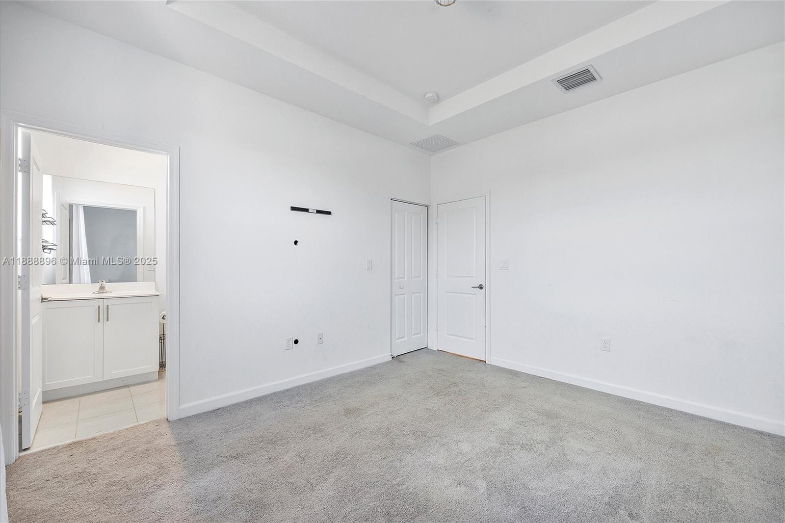 10013 Southwest 228th Terrace, Unit 10013 Miami, FL 33190 - Photo 26 of 39 a view of an empty room