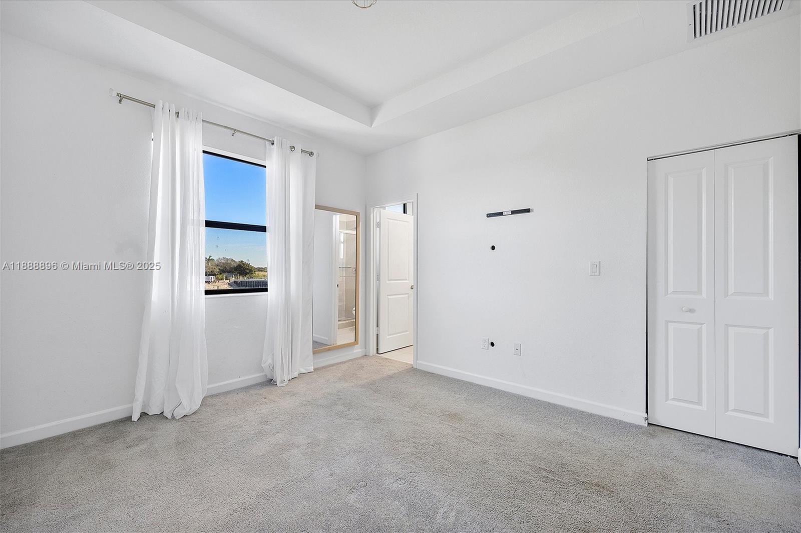 10013 Southwest 228th Terrace, Unit 10013 Miami, FL 33190 - Photo 27 of 39 a view of an empty room