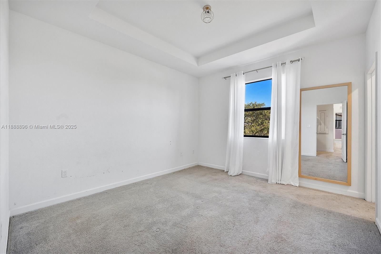 10013 Southwest 228th Terrace, Unit 10013 Miami, FL 33190 - Photo 28 of 39 an empty room with closet area
