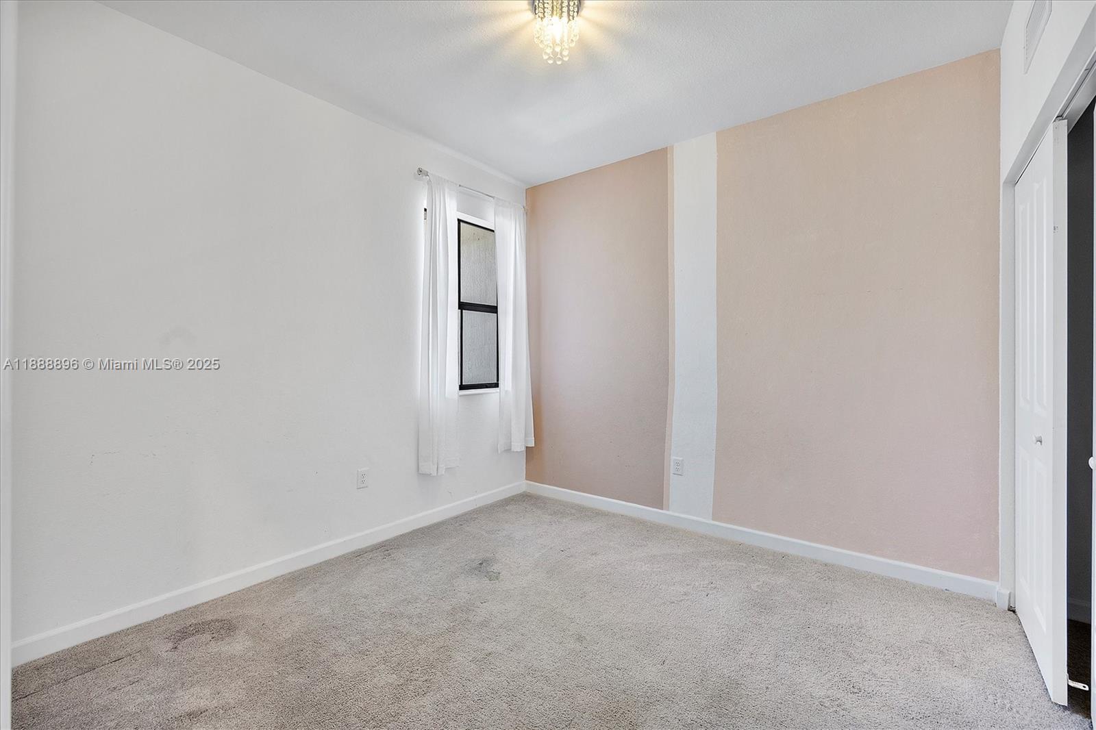 10013 Southwest 228th Terrace, Unit 10013 Miami, FL 33190 - Photo 30 of 39 wooden floor in an empty room