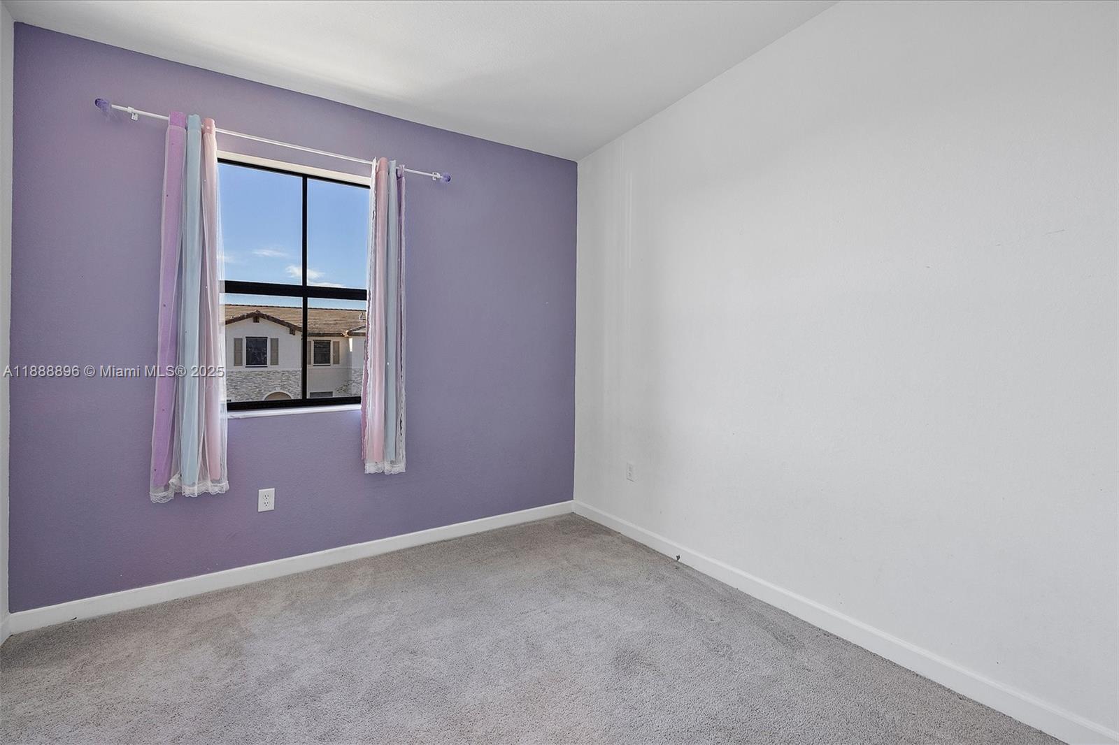 10013 Southwest 228th Terrace, Unit 10013 Miami, FL 33190 - Photo 34 of 39 an empty room with windows