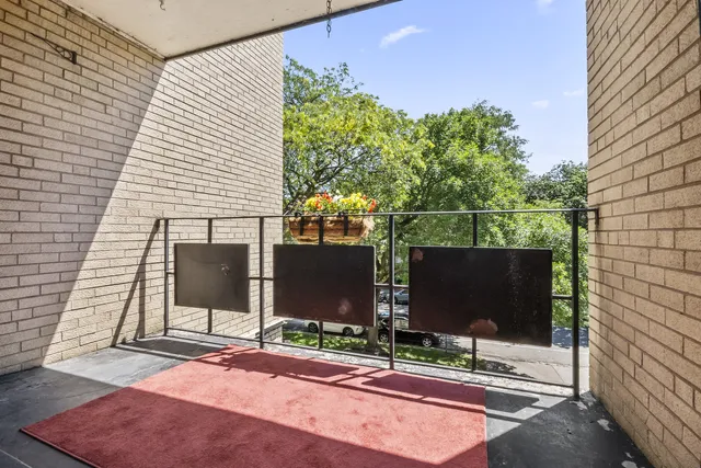 a view of a backyard with sitting area