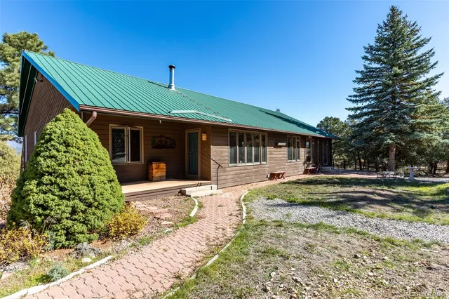a view of a yard with an outdoor space