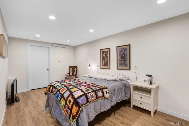 a living room with furniture rug and window