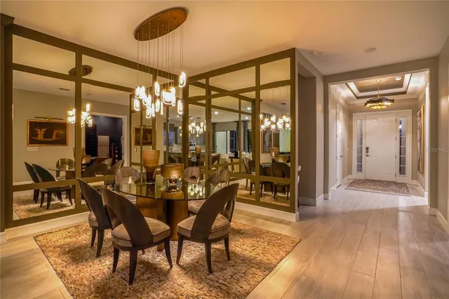 a large kitchen with kitchen island a sink stainless steel appliances and cabinets